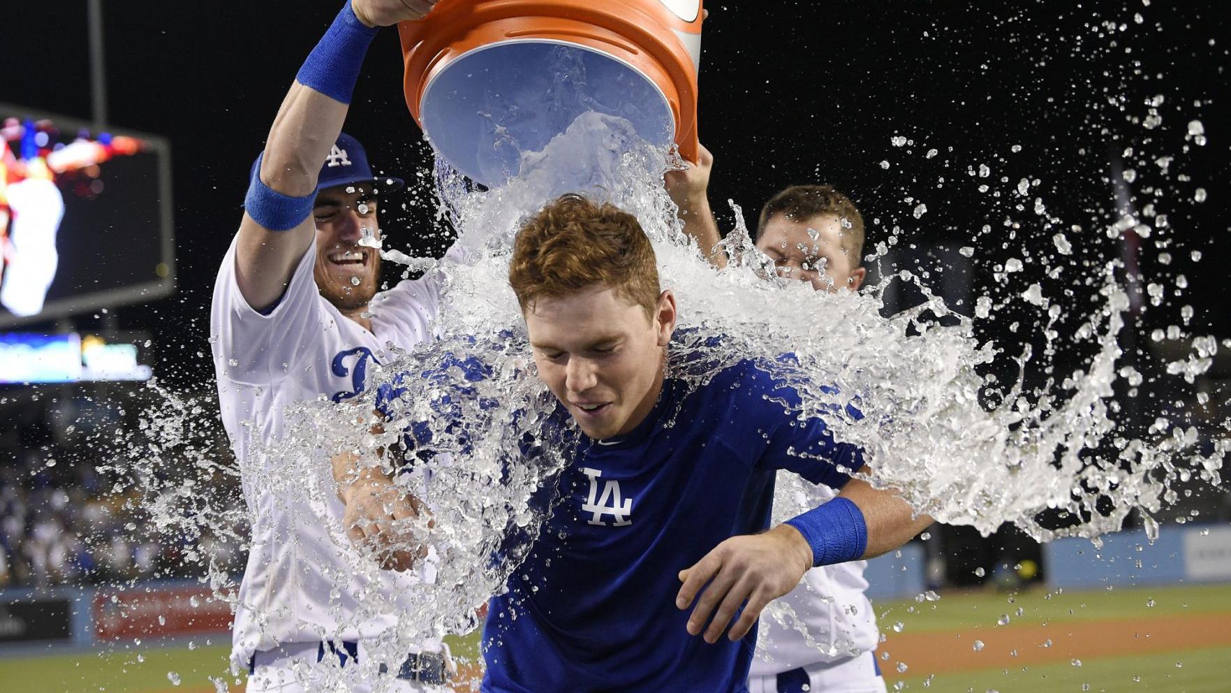 Will Smith is doused by Cody Bellinger